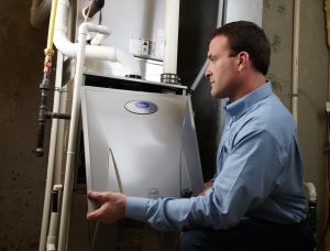 hvac technician performing furnace repair