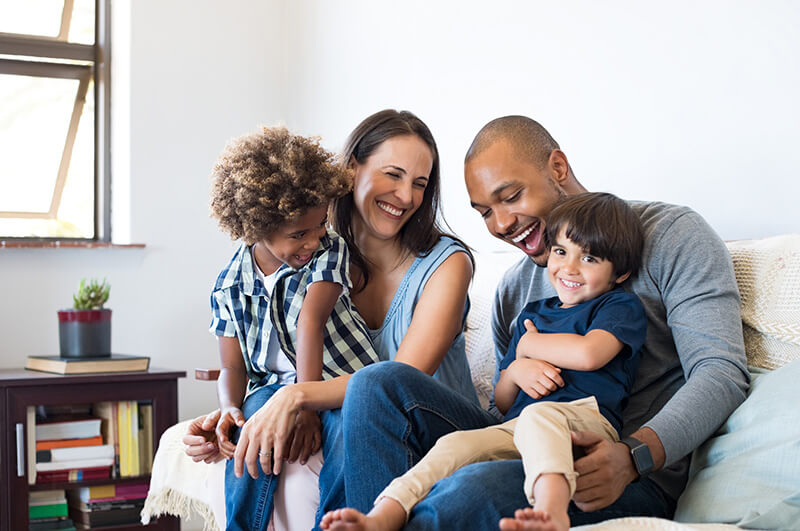 Young family having fun at home