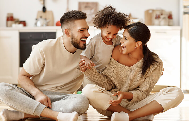 family of 3 enjoying their heating services