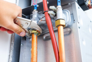 technician providing water heater repair